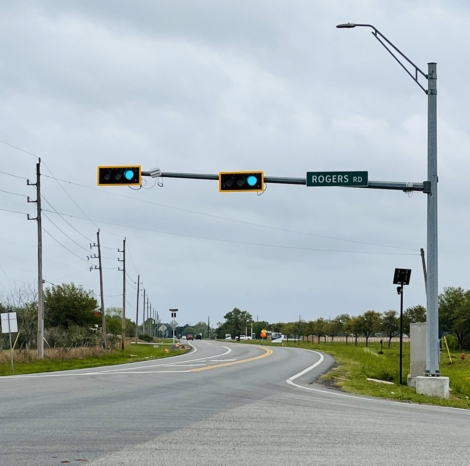 In response to ongoing residential and commercial growth in the Fulshear area, the caution light signal at the FM 359-Rogers Road intersection has been replaced with red light signals.